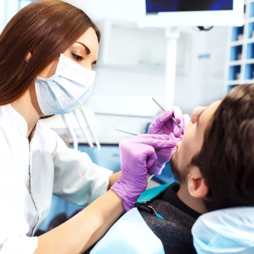 Professional woman dentist doctor working. woman at dental clinic. lady woman at dentist taking care of teeth.